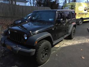 Used  Jeep Wrangler Unlimited Sport