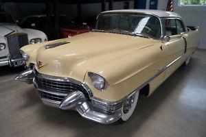  Cadillac DeVille Gold Cloth & White Leather