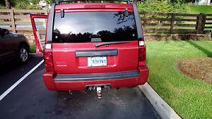  Jeep Commander Devil red/Black trim