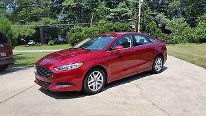  Ford Fusion Exterior: Ruby Red Clearcoat; Interior:
