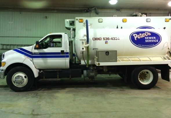  Ford F750 Septic Truck